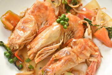 spicy stir fried river shrimp with fresh pepper  and finger root on plate