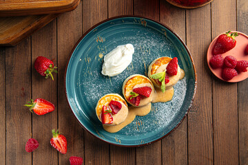 Sweet russian cottage cheese pancakes syrniki dessert