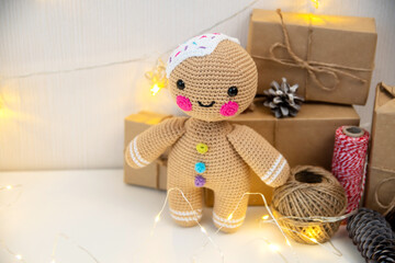 Concept decor for the birth of your own hands. Decorative toy crocheted, houses made of paper, gifts in craft paper.