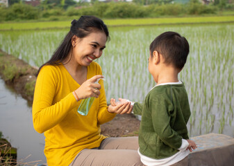 a mother uses antiseptics for her son