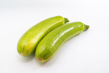 Fresh zucchini on pure white background