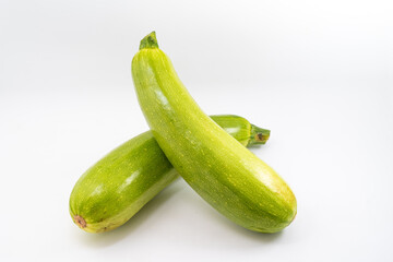 Fresh zucchini on pure white background