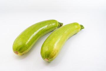 Fresh zucchini on pure white background