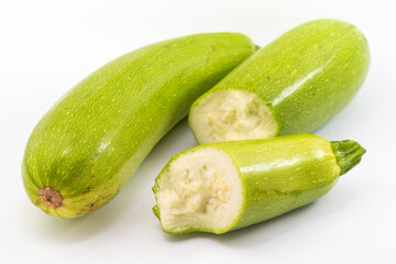 Fresh zucchini on pure white background