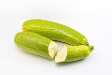 Fresh zucchini on pure white background