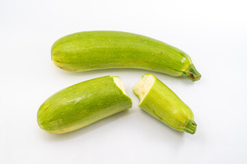 Fresh zucchini on pure white background