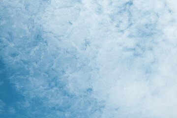 White clouds are soft and fluffy floating on blue sky for backgrounds concept, Selective focus