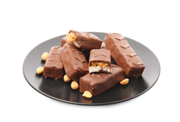 Plate of chocolate bars with caramel, nuts and nougat isolated on white