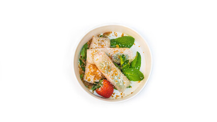 Fried spring rolls with fruit in a bowl, isolated background, white background
