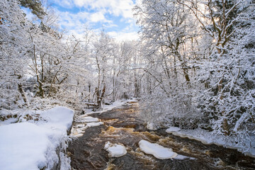 Flowing water in a river in the winter