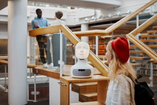 Student using voice assistant in library