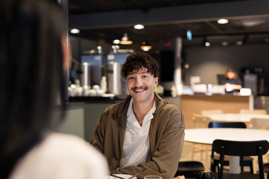 Smiling man in cafe