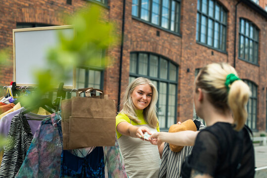 Young women at yard sale