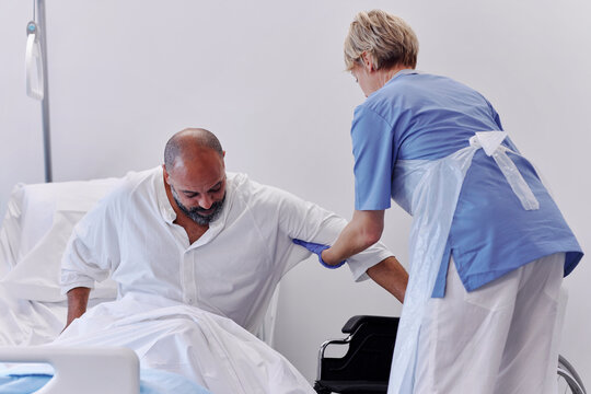 Nurse taking care of patient in hospital