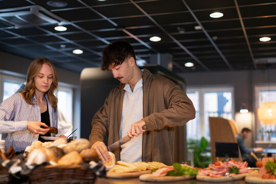People choosing food in buffet