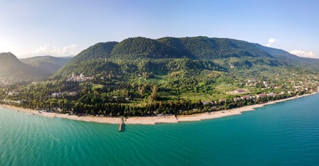 Fototapeta na wymiar Aerial view of beautiful sea and forest in Gagra, summer in the Caucasus in Abkhazia