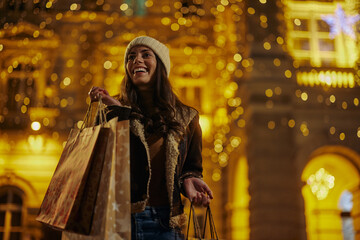 Obraz na płótnie Canvas Young woman shopping for Christmas