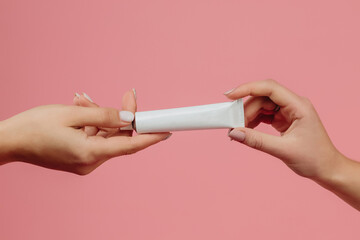 girl holding cream in her hands
