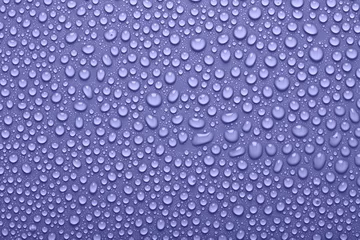 Afwasbaar behang Pantone 2022 very peri Very peri violet color water drops, abstract background or texture.