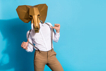 Photo of young guy enjoy theme party safari identity authentic show isolated over blue color...