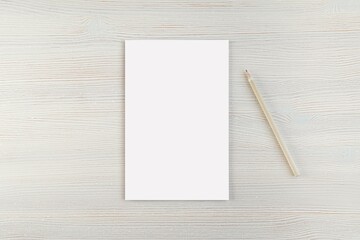 Blank notepad mockup for design or text presentation, minimal style composition with pencil.