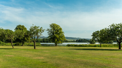 Lochside Park and Carlingwark Loch at Castle douglas on a summers day, Scotland - obrazy, fototapety, plakaty