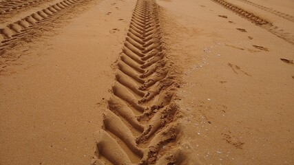 tire tracks in sand