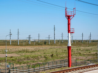 Telecommunications and power transmission towers