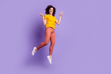 Full length photo of young charming woman good mood jumper show peace cool v-symbol isolated over violet color background