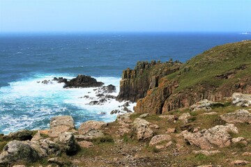 Ocean waves against cliffs