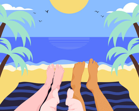 Legs of family relaxing on the beach