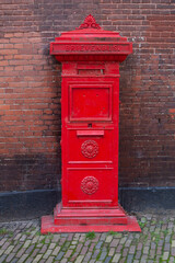 Classic red letterbox in the Netherlands