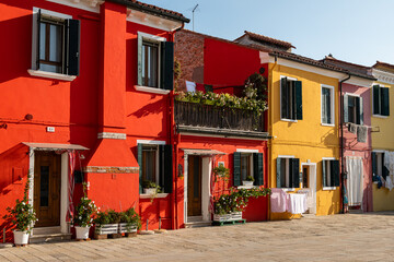 Colorful houses in Burano on a sunny day in autumn