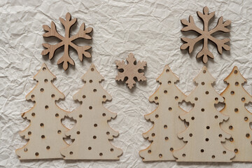 wooden christmas decorations with crumpled paper