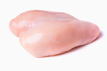 Whole raw chicken breast isolated on a white background