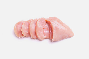 Raw chicken breast top view, chicken fillet cut into slices. isolated on a white background