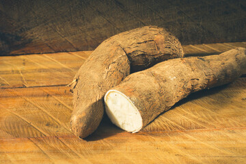 Raw Cassava Starch - Manihot esculenta. Wooden background
