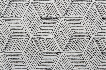 texture of black and white jacquard fabric with geometric pattern