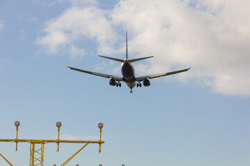 Passenger aircraft on approach to the airport for landing