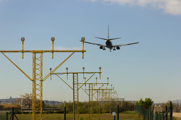 Beacons with lights, marking the entrance to the aircraft for landing on the airport runway.