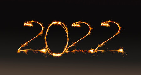 2022 numbers drawn with fireworks to count down and celebrate the beginning of the new year.