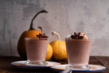 Pumpkin spice latte coffee with whipped cream