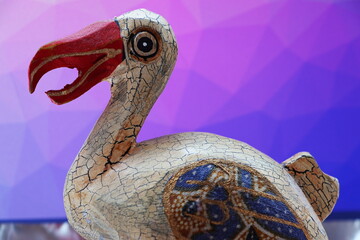 Detail of a wooden bird dodo - souvenir from the island of Mauritius © VeKroc