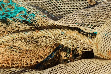 Old fishing nets in the port. Fishing nets texture.