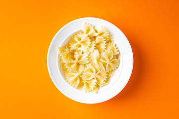 farfalle pasta bows durum wheat ready to eat healthy meal diet snack on the table copy space food...