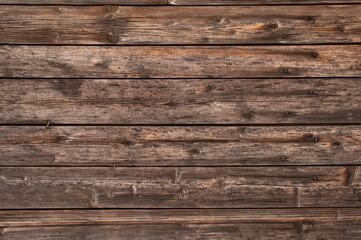 Fototapeta na wymiar wooden burnt old boards solid background