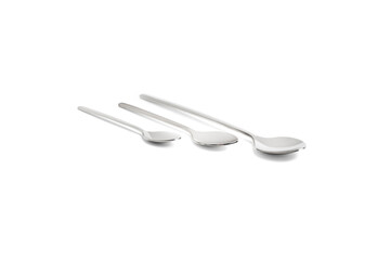 Clean shiny metal spoon isolated on white. Stainless steel small kitchen dessert teaspoon cut close up. Tablespoon. Kitchen utensils concept. Set of realistic spoons from different points of view.