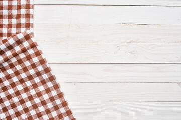 Fototapeta na wymiar plaid tablecloth wooden texture kitchen decoration design