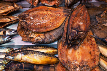 Various smoked fish products. Healthy eating and fish market concept