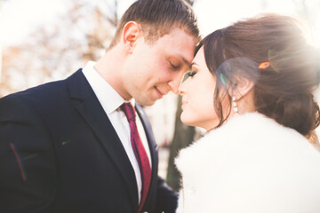 Wedding couple bride and groom holding hands
